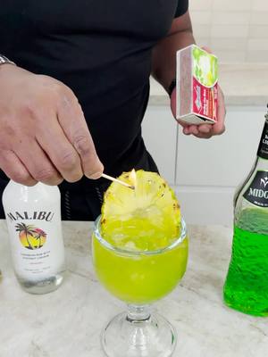 A post by @realtipsybartender on TikTok caption: Superman's Flaming Kryptonite #cocktails #superman