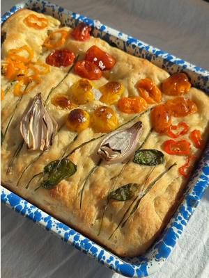 A post by @pinterest on TikTok caption: Sundays call for spring focaccia 😍 @thehanniediaries #Pinterest 