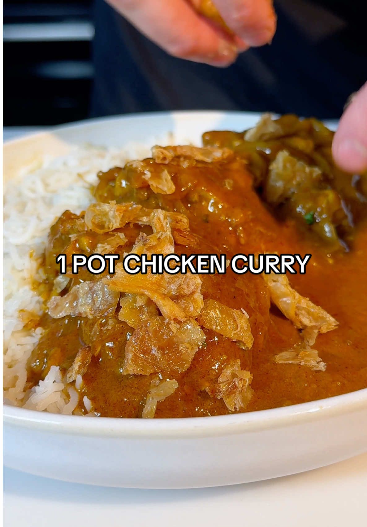 A post by @samseats on TikTok caption: 1 POT CHICKEN CURRY & CRISPY CHICKEN SKIN 🍛  This is an absolute winner of a curry. Easy to do, set and forget, yet packed FULL of rich and delicious flavours 🔥 Serves 4 - 1 tbsp olive oil - 2 onions, sliced - Salt and pepper - 1 tbsp curry powder - 1 tbsp cumin powder - 1-2 tsp chilli powder - Pinch of turmeric - 1 tbsp ground coriander - 1 cinnamon stick - 1 tsp ginger paste - 3 tsp garlic paste - 5 cardamom pods - 1 tbsp tomato paste - 400ml chicken stock - 6-8 chicken thighs - 1 x 400ml tin coconut milk 1. Fry the onions in the olive oil over a medium heat for 5 minutes until softened, then add the spices and cook for a for more minutes until fragrant. Add the remaining ingredients and bring to a simmer. 2. Cover with a lid then place the curry into an oven of 160 C / 320 F and slow cook for 2 hours. The sauce will end up rich and delicious and the chicken will be wonderfully tender. This can be made in advance and reheated in a pan just before serving. 3. To make the crispy chicken skin, sandwich between parchment paper and 2 baking trays, then place into same oven and cook for 40 minutes until golden and crisp. #chicken #curry #EasyRecipe #comfortfood 