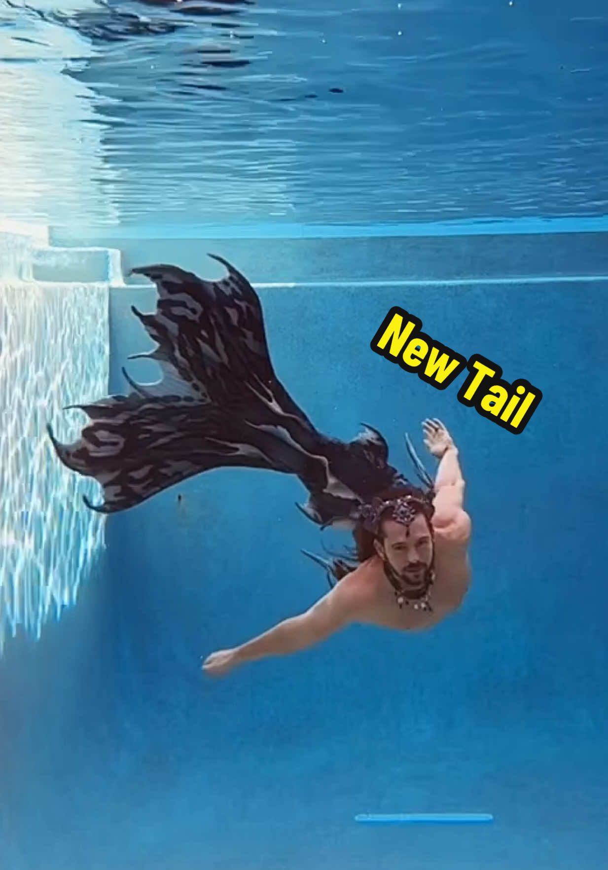 A post by @mermanthommy on TikTok caption: Meet Ailea by @Merbella Studios 💚🖤🩶 Tell me your first thoughts in the comments!!!