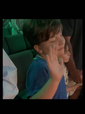 A post by @heatherwyatt715 on TikTok caption: Half way through will MELT your heart!!! This moment stopped me in my tracks. And yep! I sure did whip out that camera in the middle of church. 🤣 My baby, my Ryker,  just 7 years old standing in worship, hand lifted, eyes closed, completely overcome by the presence of God. He has every reason to be angry at the world. He lost his sister, I changed careers, we moved homes, he changed schools, his entire life changed from everything he had ever known within a year… a wound so deep no child should ever have to carry. Life has been heavy, unfair, and heartbreaking. But instead of turning away, he’s turning toward the only One who can truly heal. He’s allowing Jesus to meet him in the broken places, to bring comfort, peace, and purpose. He’s not chasing the world. He’s not worried about things. He’s seeking God. He’s chasing the only thing that matters — the heart of God. He is seeking eternal life, a heavenly home, a place where things will be the same, and he will get to be with his Savior and sister forever .                   And as his mama, there’s no greater peace than watching my son fall in love with the One who has held us through it all. “Train up a child in the way he should go: and when he is old, he will not depart from it.” – Proverbs 22:6 This… this is what it means to truly live. This is the kind of legacy I pray we leave behind. @Dexter Woods @Nicholas Garand @KMWOODS @RykerKeegs @tay 