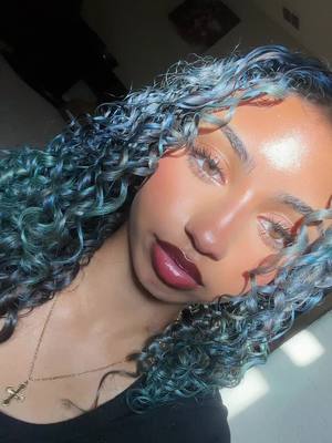 A post by @luvv4iys on TikTok caption: you snooped in my wallet?! #icywicy #bluehair #curls 