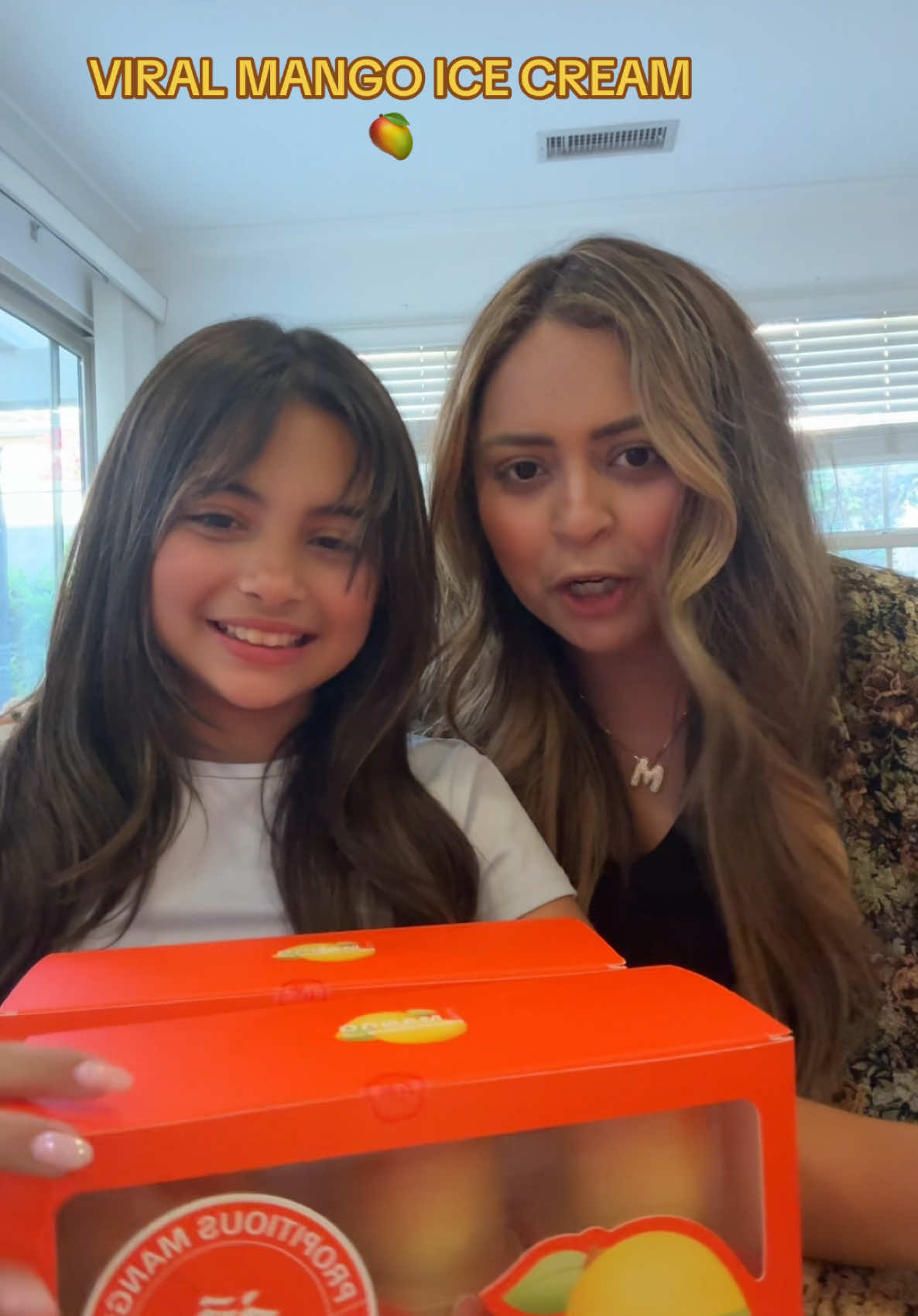 A post by @mgfoley on TikTok caption: REACTING TO THE VIRAL MANGO ICE CREAM!!!  🥭🍦10/10  #viral #viralmangoicecream #hmartfinds #hmart #blowup #motherdaughter #bsf #funny #asmr #fyp #foodie #foodtiktok #avafoley #michellefoley #review #Reacting