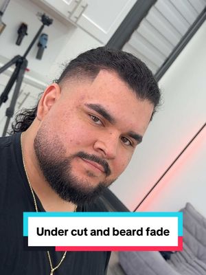 A post by @ivanthegreat86 on TikTok caption: Does he look like Jason momoa ? 🤣 #dallasbarber #menshairstyle #Texasbarber #hairtransformation #curlyhair #undercut #beard 