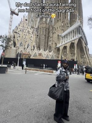 A post by @iconic.ceo on TikTok caption: Can someone make a edit out of this?🫡 #foryou #aurafarming #barcelona #sagradafamilia 