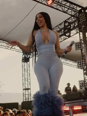 A post by @iamcardib on TikTok caption: Brought a BARDI PARTY to the desert and served up @Whipshots for @Revolve 💃 #REVOLVEfestival owes me nothing honey! 
