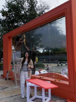 A post by @reefilm_display on TikTok caption: Reefilm LED film screen is easy to install  #china #ledwall #glass #ledscreen #reefilm #leddisplay #hottest #transparent #install #panel #ledfilm 