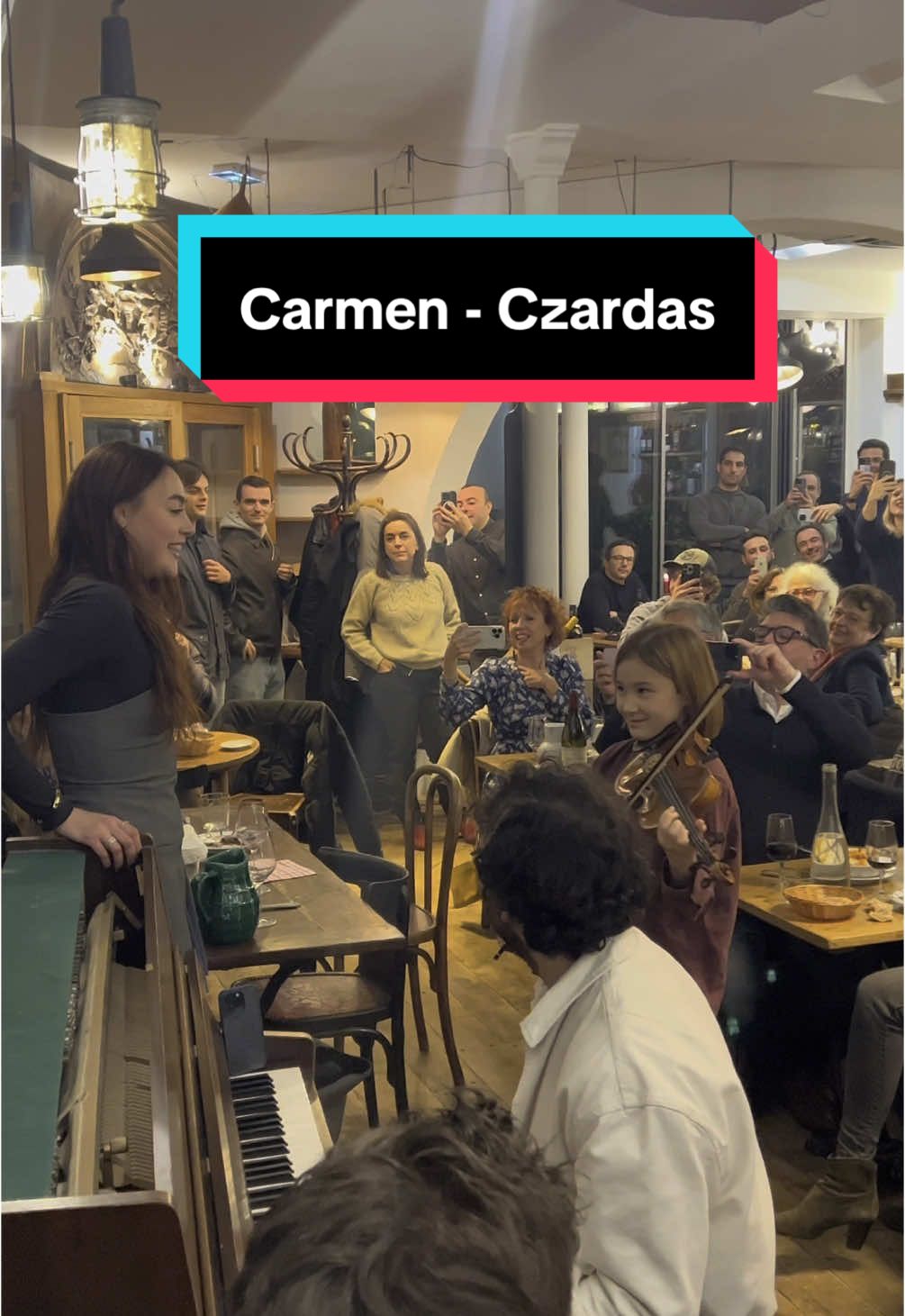 A post by @juliencohen_piano on TikTok caption: She asked for Carmen but no one in the restaurant expected what would happen… 😂 Watch what the little boy will do at the end 😱🎻 With @Sone 