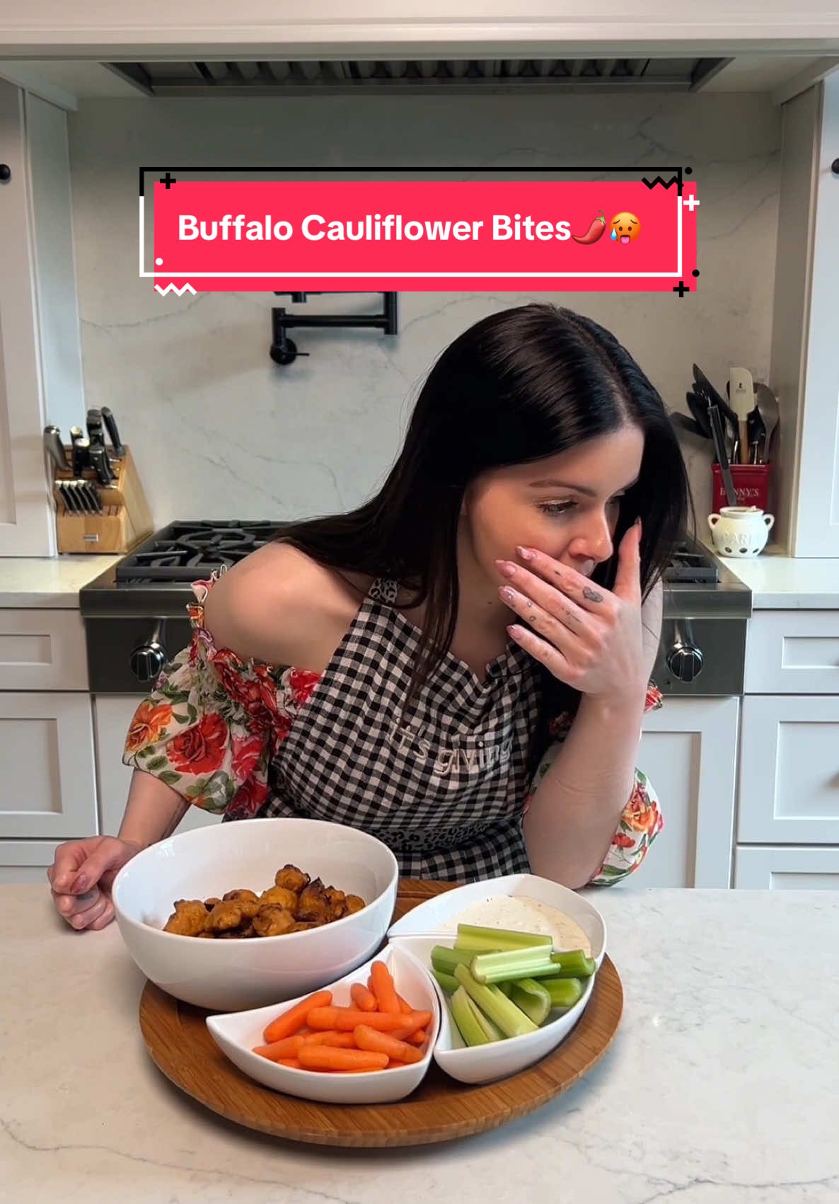 A post by @arielwinter on TikTok caption: Okay guys I don’t eat spicy food often clearly, but if you love spicy food you have to try this!!! Buffalo Cauliflower Bites NOT for the weak 🌶️ lovers ONLY😂 (I am the weak) 1 Large Cauliflower Head— cut into florets, rinsed and dried 1/2c Flour Garlic Powder Paprika Hot Paprika Chili Powder Salt Black Pepper 1/2c Water Hot Sauce Lemon Juice Melted Butter Blue Cheese Dressing or Ranch Carrots Celery Preheat your oven to 450 degrees. If you are using a nonstick baking sheet like the one I am, great! If not, use cooking spray or line it with parchment paper. In a large bowl, combine flour, garlic powder, paprika, hot paprika, chili powder, salt, black pepper and water and whisk until smooth. Add cauliflower to the batter and mix to coat. Spread the cauliflower onto the baking sheet in a single layer with space between them. Bake in the oven for 20-25 minutes. You want them lightly brown! Halfway through you’ll want to flip them :) In another bowl, combine hot sauce, melted butter and lemon juice until well mixed. Brush the buffalo sauce over the cauliflower and return to the oven to bake for another 15 minutes or so until they brown. Serve hot with whatever dressing you prefer and raw veggies!!! Enjoy and prepare for spicy butthole because these are SPICYYYYY🥵😅😂 #cauliflowerrecipes #buffalocauliflower #creatorsearchinsights 