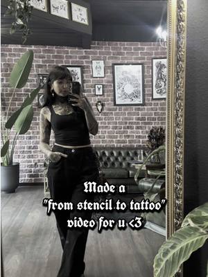A post by @ginamadskull on TikTok caption: I'm Based in Switzerland ZH Use the link in my bio for bookings 🖤 . #tattoo#tattooart#tattooideas#tattooinspo#Art#tattooartist#swisstattooartist#swisstattoo#girlswithtattoos#alt#altgirl#queertattooartist#tattoolover#switzerland#zurich