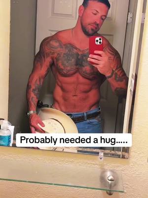 A post by @nottattedfire on TikTok caption: Probably needed a hug #probablyneededahug #cowboy #wranglers #muscle #tattoos #beach #abs #fyp