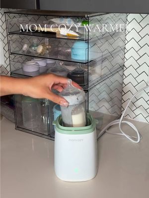 A post by @sheenaabrooks on TikTok caption: trying out the mom cozy bottle warmer and I love it so far!✨ @Momcozy US #momcozy #momcozymom #bottlewarmer #momcozyshop #tiktokshop 
