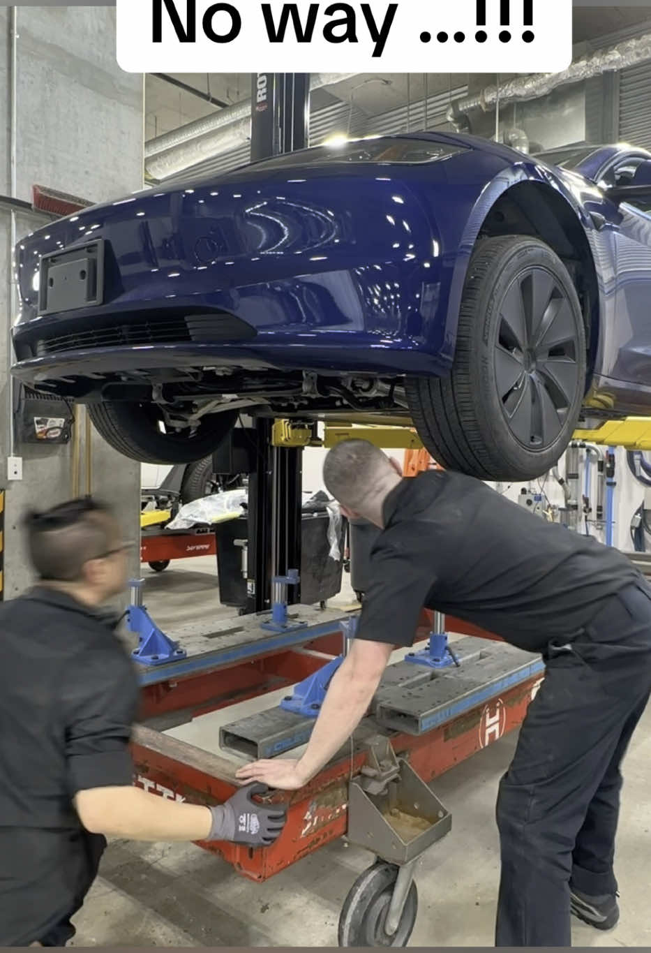 A post by @luxury.car.repair on TikTok caption: Tesla model 3 getting a new rear end, full video now up on my YouTube channel LINK IN BIO #tesla #teslamodel3 #teslamotorsclub #teslalife #teslaclub #luxurycarrepair #bodyshoplife #autobody #bodyshop #panelbeater #collision #collisioncenter #autobodyshop #collisionrepair #autobodyrepair
