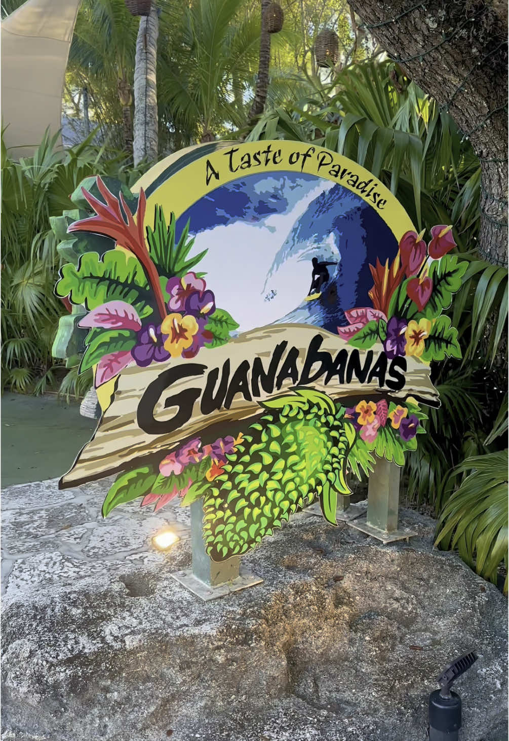 A post by @thingstodo.florida on TikTok caption: Take in the lush tropical surroundings and atmosphere in Jupiter, Florida at Guanabanas!  Located in the Palm Beaches of South Florida, Guanabanas offers great food, live music, and all the island vibes to have you feeling like you’re on vacation! Next time you’re looking to kickback along the water in Jupiter, check out @guanabanasrestaurant 😎🌴🌺 • • • • • #guanabanas #jupiterflorida #palmbeach #southflorida #tropical #islandvibes #tiki #palmbeacheats #thingstodoinsouthflorida 