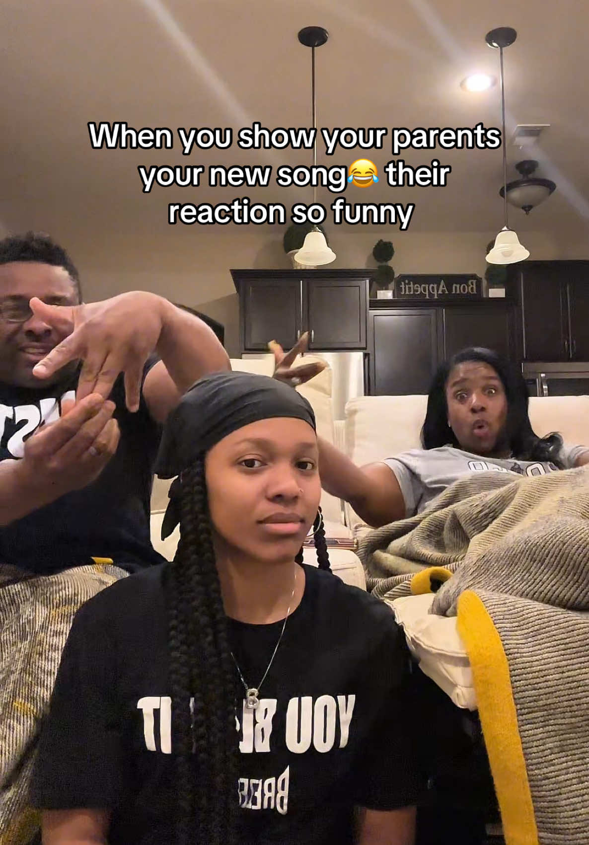 A post by @brezay__ on TikTok caption: My parents passed the vibe check 😂😂😂 #brezay #funny #reactionvideo #reactionvideo #laugh #coolparents 