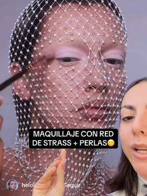 A post by @cande.copello on TikTok caption: Maquillaje con tela de red de strass + perlas en el medio 😶🫠 no veía el fin! IB @heloiseravon #makeup #maquillaje #makeuphacks 
