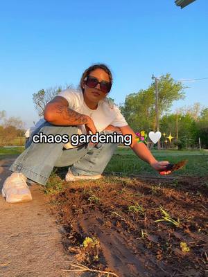 A post by @bbyjalea on TikTok caption: 🤪 CHAOS gardening.. I really put the chaos in it😂🤍💐💕  #foryou #fyp #singlemom #chaosgardening 