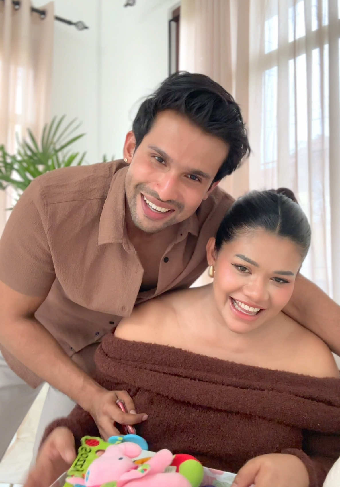 A post by @harshyuofficial on TikTok caption: "Watch your little genius grow! 🧠✨ @Everly Elegant  #BrainDevelopment #BabySmarties #playtime #fypシviralvideoforyouii #fyp #srilankan_tik_tok🇱🇰 #srilankangirl #slcouple #fyplanka #whattowatch #trendingnow #couplegoals #family #love 