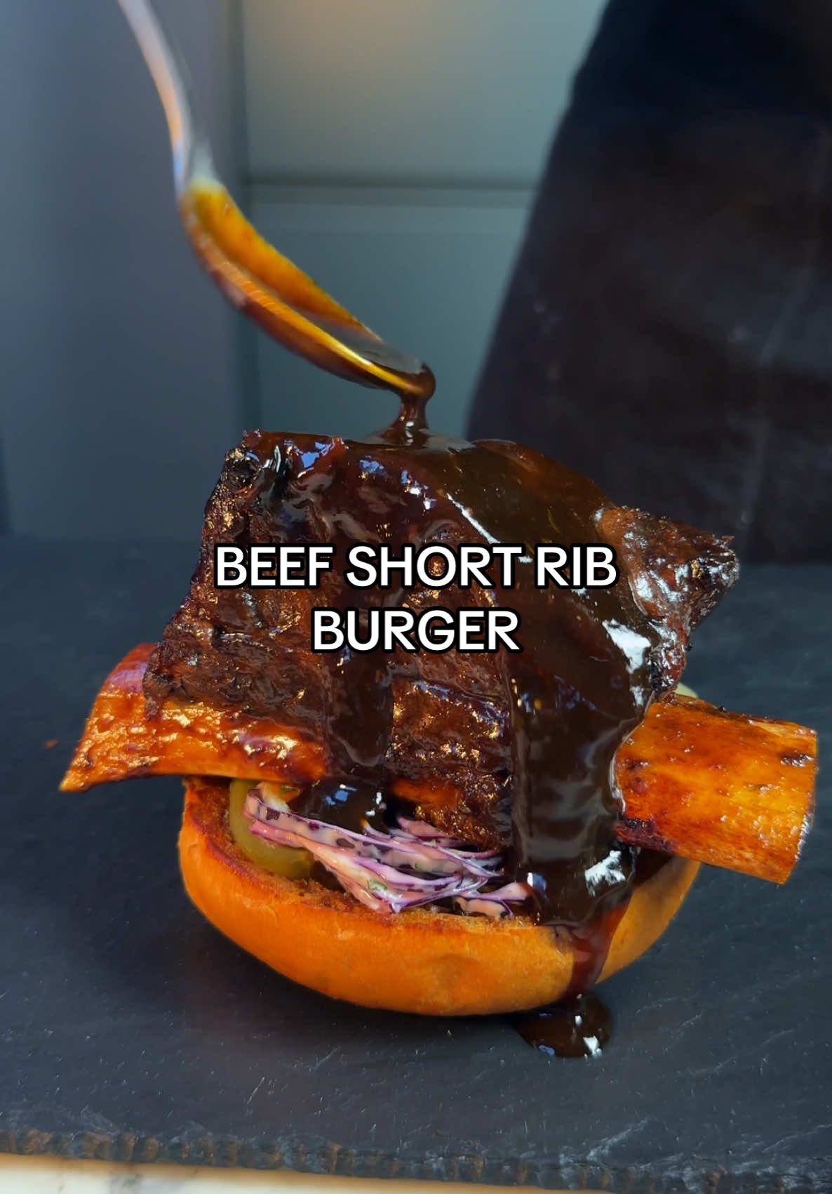 A post by @samseats on TikTok caption: Beef Short Rib Burger 🍔 #burger #bbq #cooking #asmr 