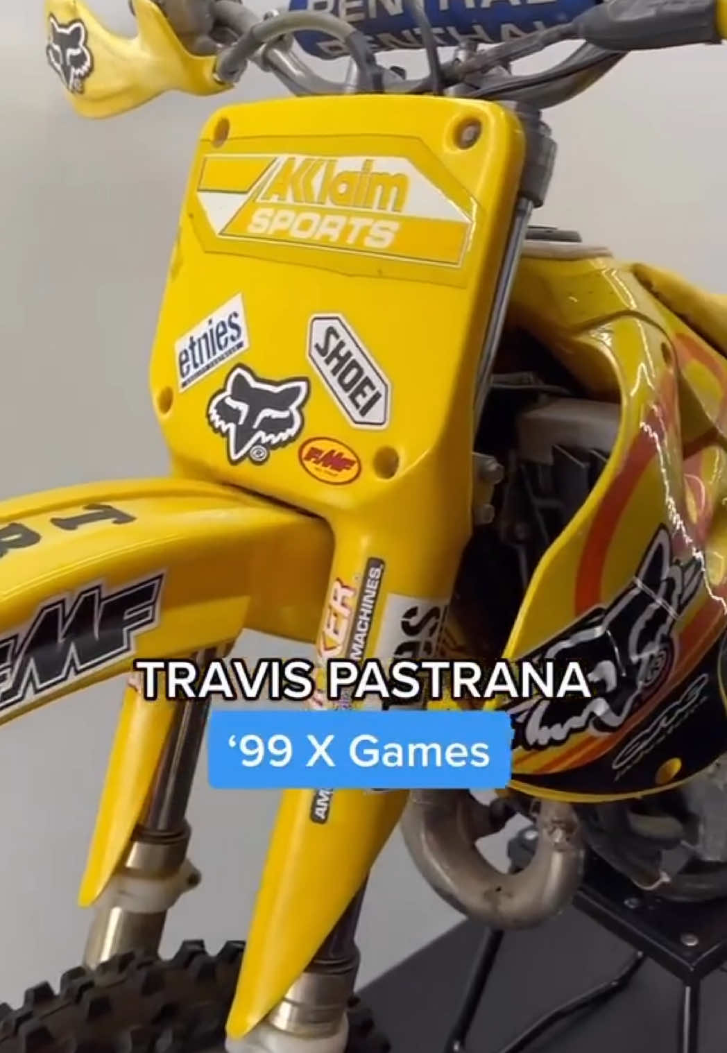 A post by @foxracing on TikTok caption: Display bikes at Fox Racing HQ #foxracing #dirtbikes #rickycarmichael #travispastrana 