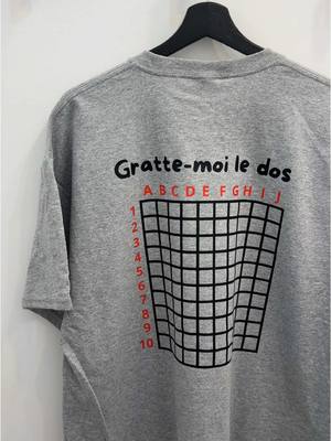 A post by @brodame.ca on TikTok caption: P’tite partie de battleship sur ton dos quand ça te pique?🚢 Une belle commande originale et personnalisée👀 #customtee #impression #brodame 