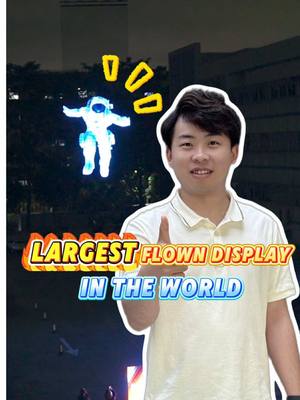 A post by @filmbase_smartfilm_leo on TikTok caption: Largest flown display in the world #ledglass #leddisplay #ledscreen #displayglass #ledfilm #transparentdisplay #ledscreen #3ddisplay #glassdisplay #filmbaseleo #flyingdisplay 