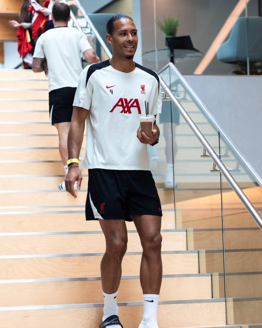 A post by @liverpoolfc on TikTok caption: All checked-in! ✅ #LFC #LiverpoolFC