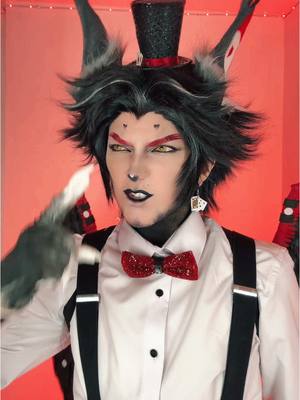 A post by @.ayoitslani on TikTok caption: Don’t like this video much but OH WELL🥰 #husk #angeldust #cosplay #hazbin hotel 
