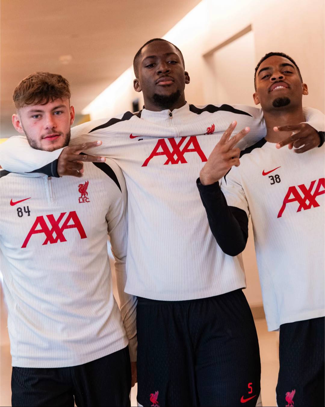 A post by @liverpoolfc on TikTok caption: Putting in the work at the AXA Training Centre 💪 #LFC #LiverpoolFC 