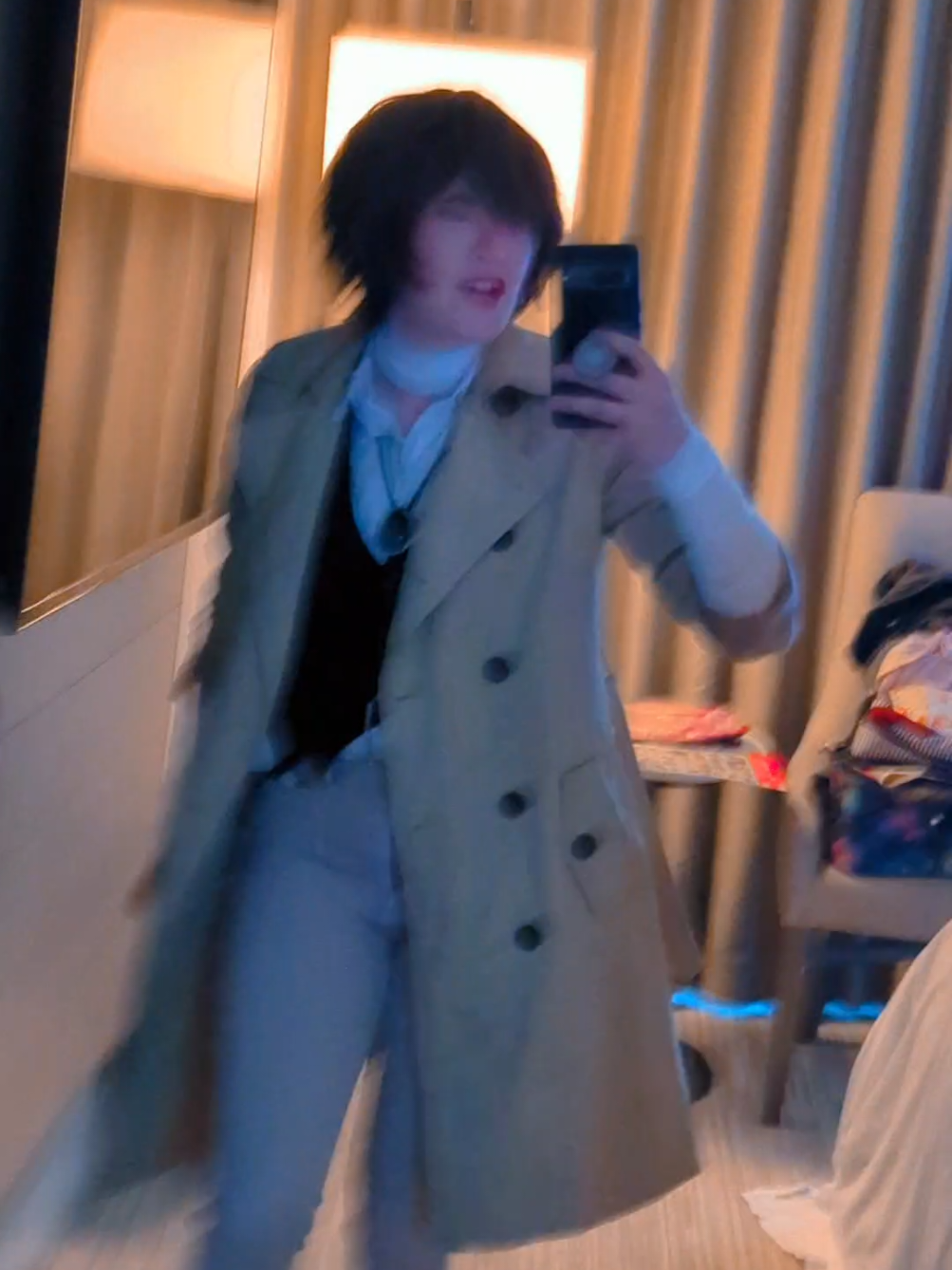 A post by @alycas_cosplay on TikTok caption: Sakuracon day 1!!! Brought my Dazai cosplay back lads!! #alycascos #cosplay #dazai #bungoustraydogs #sakuracon2025 