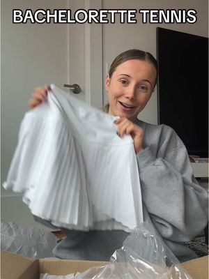A post by @thefinancebrides on TikTok caption: Not the matching @aerie tennis outfits!!!! are you kidding?!😭😍🤭🎾 #bachelorettetrip #bacheloretteoutfit #bacheloretteactivities #bachelorette #bacheloretteparty #bachelorettegoodiebags #bachelorettepr #bachelorettegifts #bridesmaidgifts #bridalpartygifts #bachparty #weddingplanning #bridetobe #summerbride #njbrides #2025bride #2026bride #tennisoutfit 