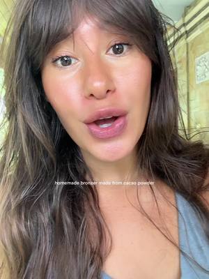 A post by @victoria__benitez on TikTok caption: Ingredients: 1 tsp beeswax (natural barrier + skin protector). 1 tbsp coconut oil (deep hydration) ½ tsp vitamin E oil (antioxidant-rich skin support) 1-2 tsp cacao powder (natural pigment + antioxidants) Instructions: 1. melt beeswax and coconut oil in a coconut oil in a double boiler 2. Remove from heat and stir in vitamin E oil. 3. Whisk in cacao powder slowly, adjusting to your desired tone. 4. Pour into a small container and let cool completely. 5. Use fingers or a brush to apply-your skin will thank you.