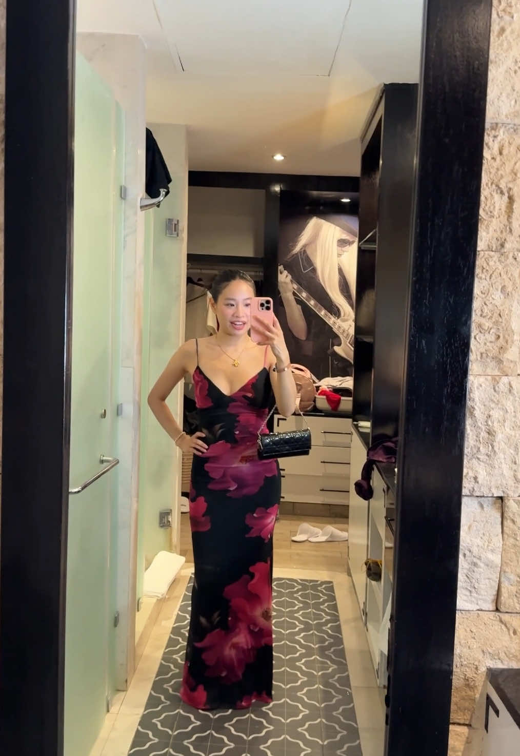 A post by @lizzymwong on TikTok caption: I was panicking about the time but at least I wasn’t the last one to show up #grwm #gdwmblackgirls #dinneroutfit #longdress #floraldress #cancun #hrhrivieramaya  #innerchildretreat @Hard Rock Hotel Riviera Maya 