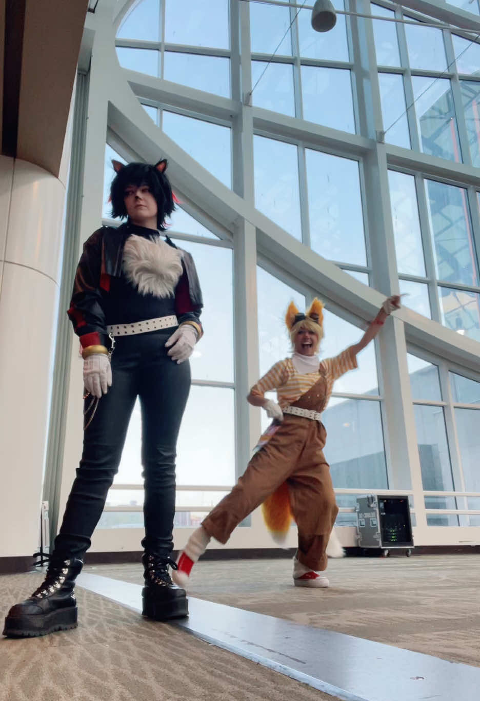 A post by @toastertopia on TikTok caption: @Cube who let shadow babysit #sakuracon #sakuracon2025 #sonicthehedgehog #shadowthehedgehog #tailsthefox #tailscosplay #shadowcosplay 