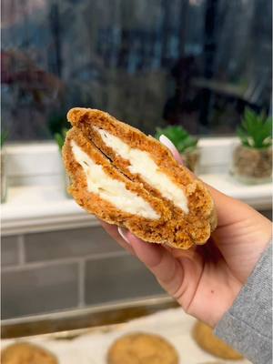 A post by @liviabenson on TikTok caption: carrot cake cheesecake cookies 🥕🐰 #eastersunday #spring #baking #easter #easterrecipes #carrotcake #cheesecake #cookies #eastereggs #EasyRecipes #recipes 