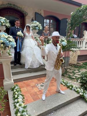 A post by @joysaxlive on TikTok caption: An unforgettable exit from home of a bride with her father. Special Guest Joy Sax Available worldwide🌎 Disponibile in tutta Italia🇮🇹  Based in Calabria - Italy🇮🇹 #joysax #hallelujah #saxophone #saxophone🎷 #weddinghome #wedding #weddingday #bride #sposa 