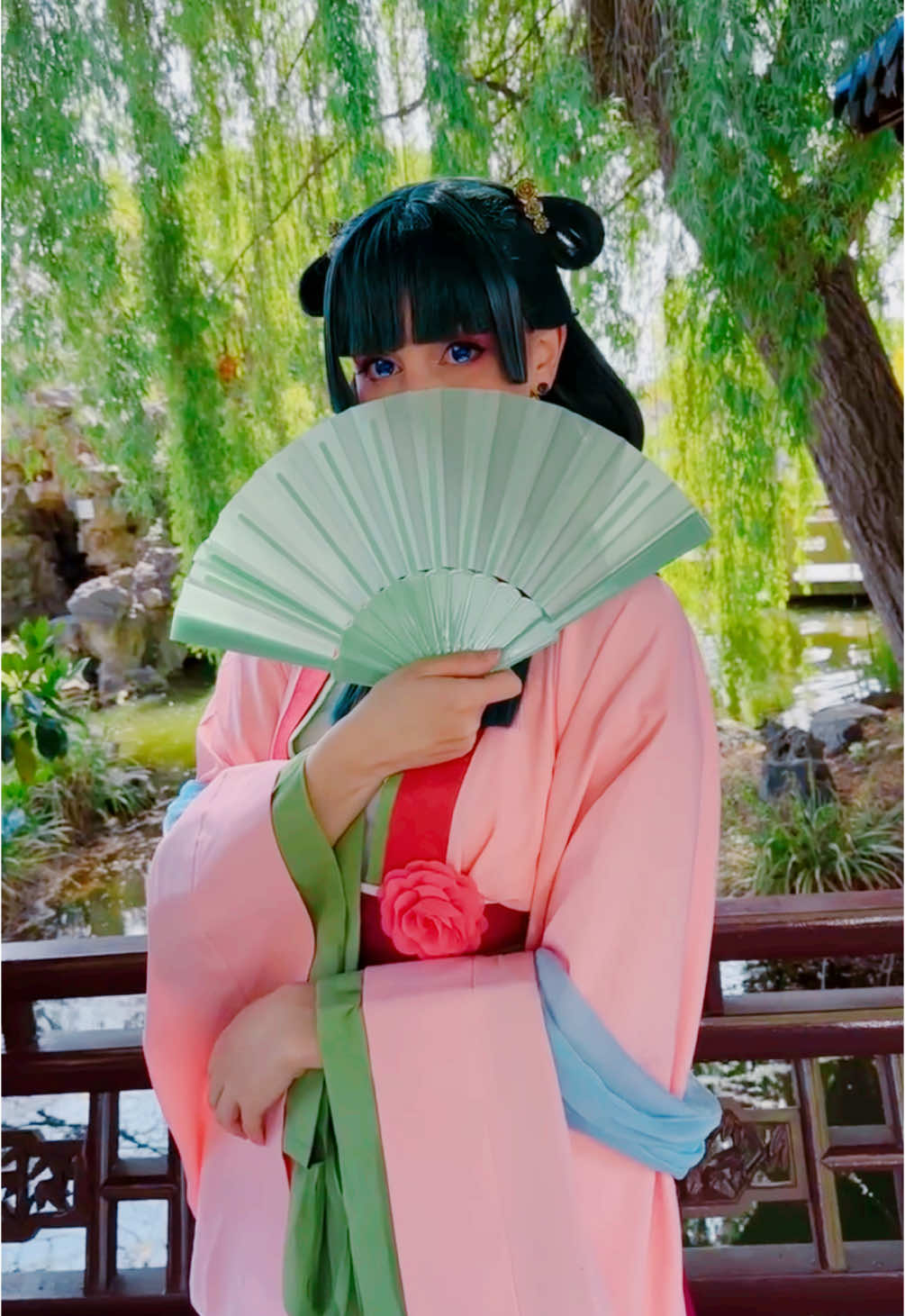 A post by @ on TikTok caption: 💐🌸✨💕 #maomao #maomaocosplay #maomaoxjinshi #maomaotheapothecarydiaries #apothecarydiaries #uwowocosplay #jinshi #jinshixmaomao 