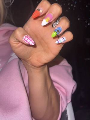 A post by @misscarriejune on TikTok caption: Easter nails 🐣