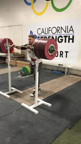 A post by @californiastrength on TikTok caption: 272 kg / 600 lbs Back Squat @weskitts @Muscle Milk @Technogym @TrainHeroic—Training App 