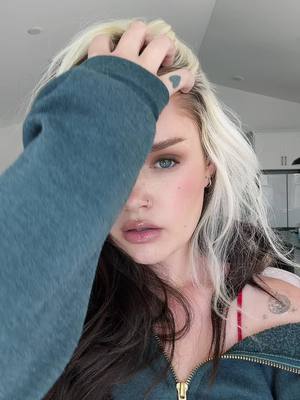A post by @ashxlevi on TikTok caption: my drafts are filled with hair transitions 