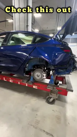 A post by @luxury.car.repair on TikTok caption: New video just up, go over to my YouTube channel to see it. LINK IN BIO  • #tesla #teslamodel3 #teslamotorsclub #teslalife #teslaclub #luxurycarrepair #bodyshoplife #autobody #bodyshop #panelbeater #collision #collisioncenter #autobodyshop #collisionrepair #autobodyrepair 