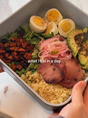 A post by @leanadeeb on TikTok caption: what I eat in a day (meal prep edition)  I cook for 3 days 🤍 filmed the whole thing for YouTube - stay tuned for it to go live next week  1. Ginger lemon shot + fresh oj  2. @Bloom Nutrition creatine and greens  3. Breakfast bowl  - sweet potato hash with buffalo honey glaze  - arugula - avocado with zaatar - hard boiled eggs  - beef summer sausage cooked  - pickled onions  - quinoa  4. @bloomsupps energy drink  5. Chicken Milanese’s + cabbage salad with pomegranate molasses vinaigrette  6. Watermelon juice + dates with almond butter  7. Kousa (stuffed squash with yogurt on the side)  Hope you enjoy 🤍 #bloompartner 