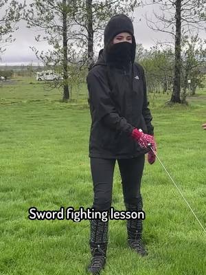 A post by @pattygurdy on TikTok caption: ⚔️Only I’d show up to sword lessons looking like a bank robber! 😂 See the full Rise Up video on YouTube #pattygurdy #riseup #tavernalbum #hurdygurdy #folk #fantasy #medieval #behindthescenes