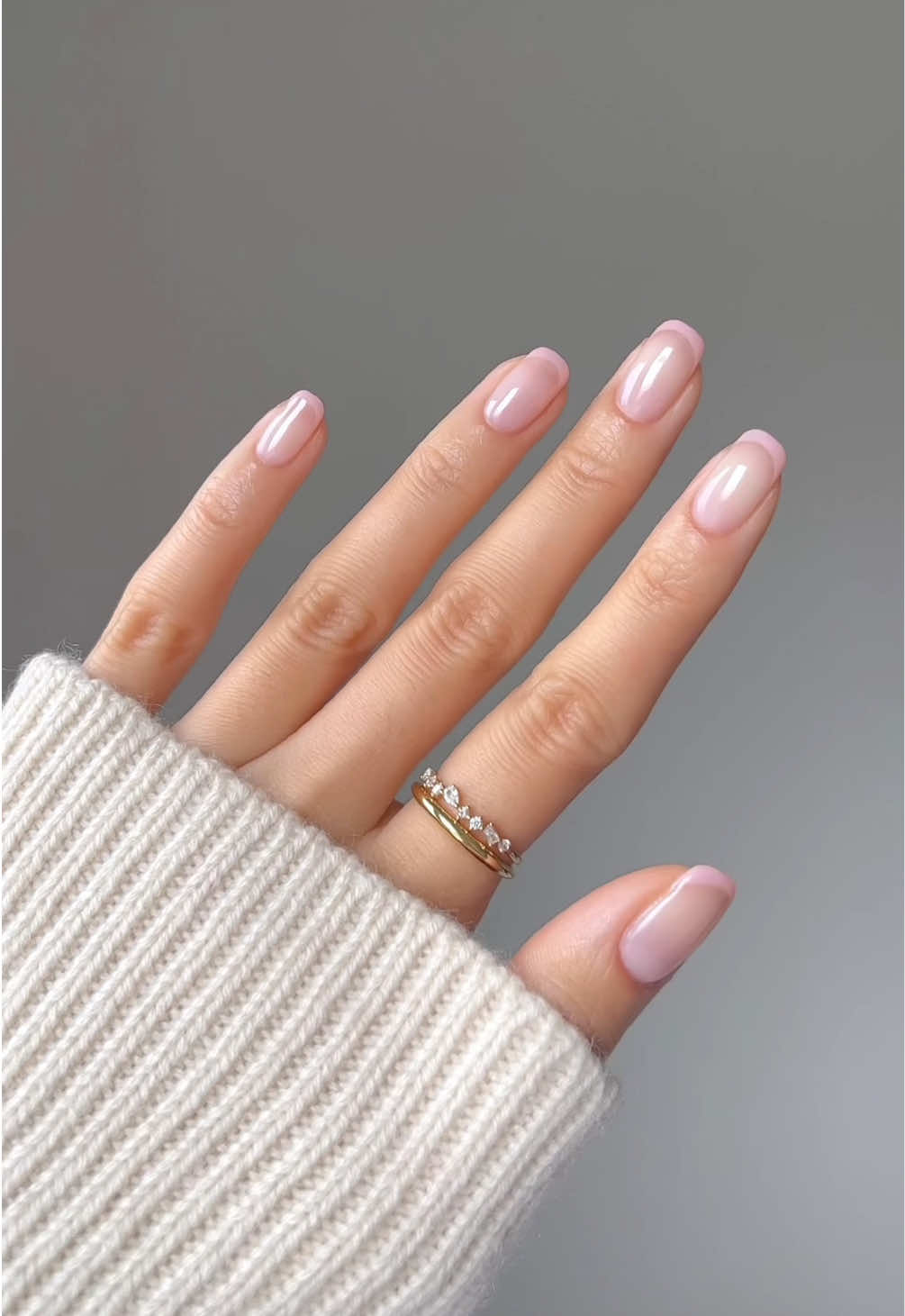 A post by @nailsbyalsn on TikTok caption: pink on pink for spring 🌸💗✨  using @essie sheer fantasy, gossamer garments, gel couture top coat #essiepartner #ad #springnails 