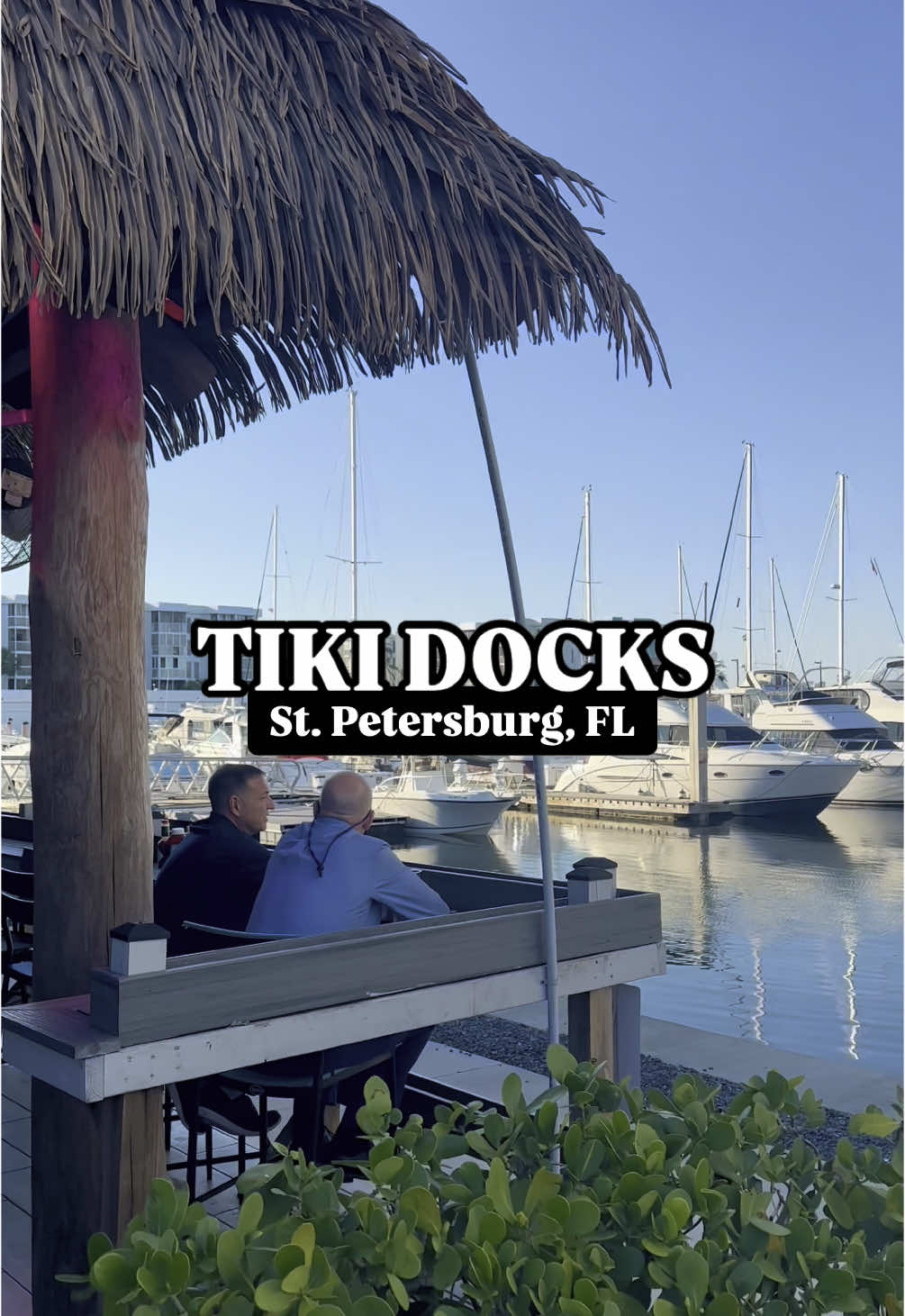 A post by @thingstodo.florida on TikTok caption: Kickback along the water in St. Petersburg, Florida at Tiki Docks!  Tiki Docks is a fun and tropical restaurant that offers many island favorites like tacos, burgers, steak skewers, lobster rolls, and more to go along with delicious tiki and boat drinks! Next time you’re looking for great food, great drinks, and tropical vibes, check out @Tiki docks in St. Pete! 😎🌴🌺 • • • • • #tikidocks #stpete #stpetersburg #tampabay #tropical #tikibar #islandstyle #tampabayeats #thingstodointampabay 