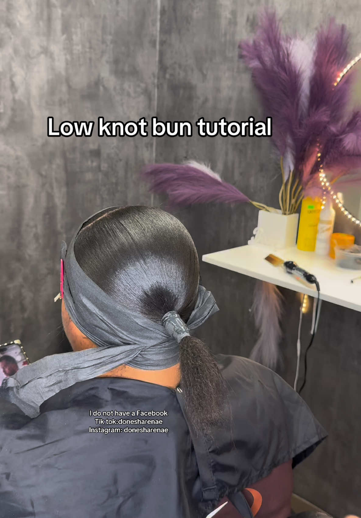 A post by @donesharenae on TikTok caption: Try this technique for an easier bun 💕✨ #ClevelandHairstylist #SleepPonytail #sleekpony #lowknotbun