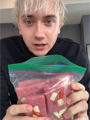 A post by @logagm on TikTok caption: First time trying Vietnamese raw fermented pork 
