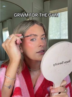 A post by @whitneyysimmons on TikTok caption: OH WE HAVE A LOT TO CATCH UP ON 💅🏼💞💐✨ grwm for the gym!!!! @Diorbeauty skin perfect stick @Saie sun melt in light bronze @Kosas color corrector + cloud set in candy @Tower 28 Beauty serum concealer + lip liner in work of art @makeupbymario setting powder in 2 @Haus Labs by Lady Gaga velvet bronzer in bronzed umber @Huda Beauty blush filter in sunset lychee @YSL Beauty blush in 37 + lash clash in brown @urban decay hyaluronic acid all nighter @tarte cosmetics go with the faux freckles in light @Rare Beauty brow gel @Benefit Cosmetics mighty fine brow pen @makeupforever super boost gloss in 04 #chattygrwm #grwmroutine #everydaymakeup #gymmakeup #gymgrwm #grwmforthegym #gymgirl #chitchatgrwm @Alani Nutrition 