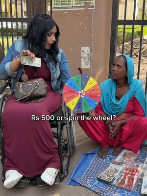 A post by @theofficialgeet on TikTok caption: Rs 500 ya wheel ko spin karoge? 🥰 4 mehnati logo ko option diya… dekho unka luck kaisa tha 🔥 Kaisa lagga humara ye latest challenge? Iss situation me aap kya karte? Join Me to Spread Happiness 👉🏼 @theofficialgeet 🥰 . . #theofficialgeet #lovegeet #humanity #randomactsofkindness #surprise #trending #elderly #streetvendor #tiktokpartner 