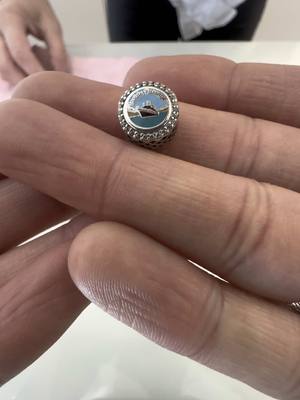 A post by @northoutletpandoralv on TikTok caption: Alaska Pandora exclusive charm #pandoraexclusive #pandora #pandorajewelry #fyp #foryoupage  